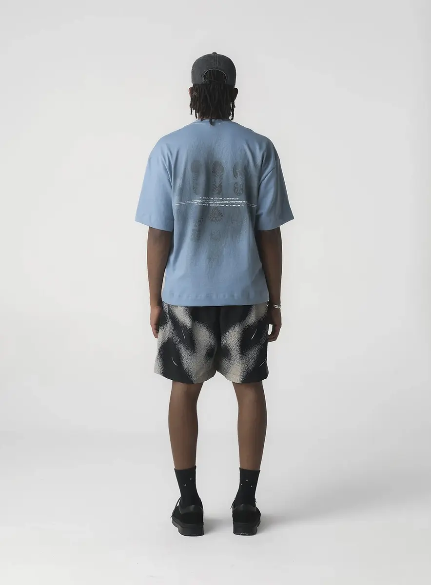 CAMISETA OVER  "TEORIA DOS PASSOS" - AZUL CLARO